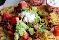 Patacón Nachos: Loaded Plantain Chips with Beef & Cheese