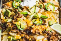 Smoky Pulled Pork Nachos with Melted Cheese and Jalapeño Crunch