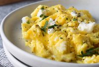 Creamy Goat Cheese Scrambled Eggs with Herbs and Cherry Tomatoes
