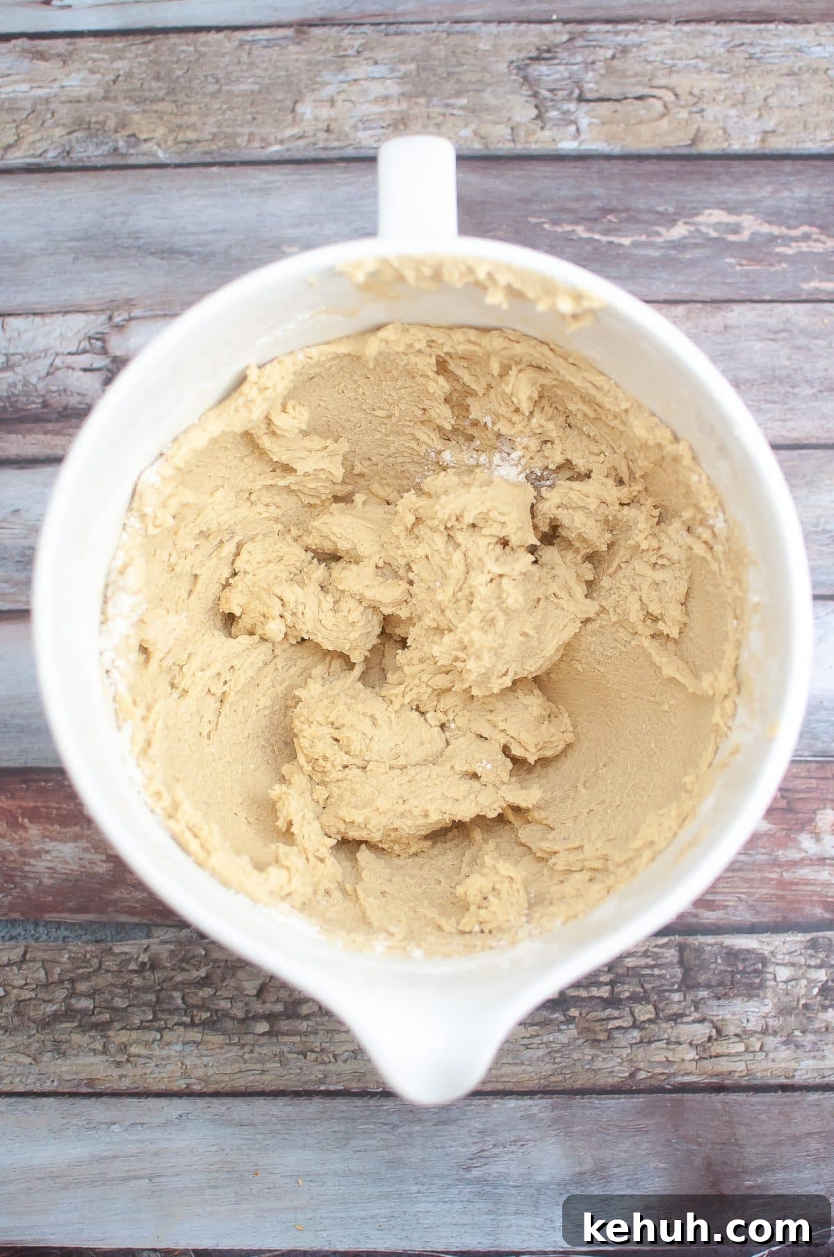 homemade cookie dough in a white mixing bowl