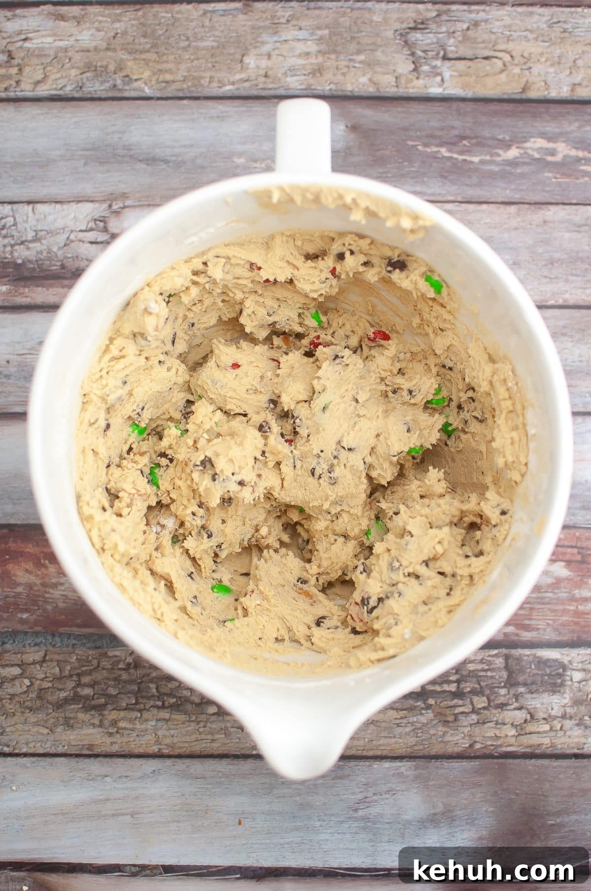 christmas cookie dough in a white mixing bowl