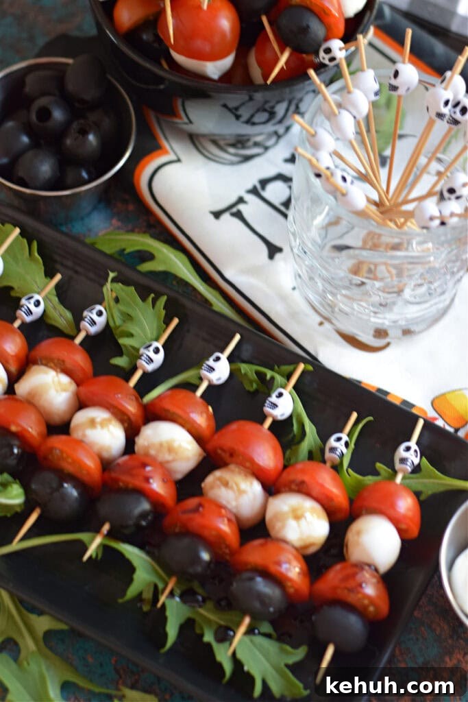 Halloween Antipasto Skewers: Festive Appetizer Ideas for Parties 2 Close up of halloween anitpasto skewers on a plate.