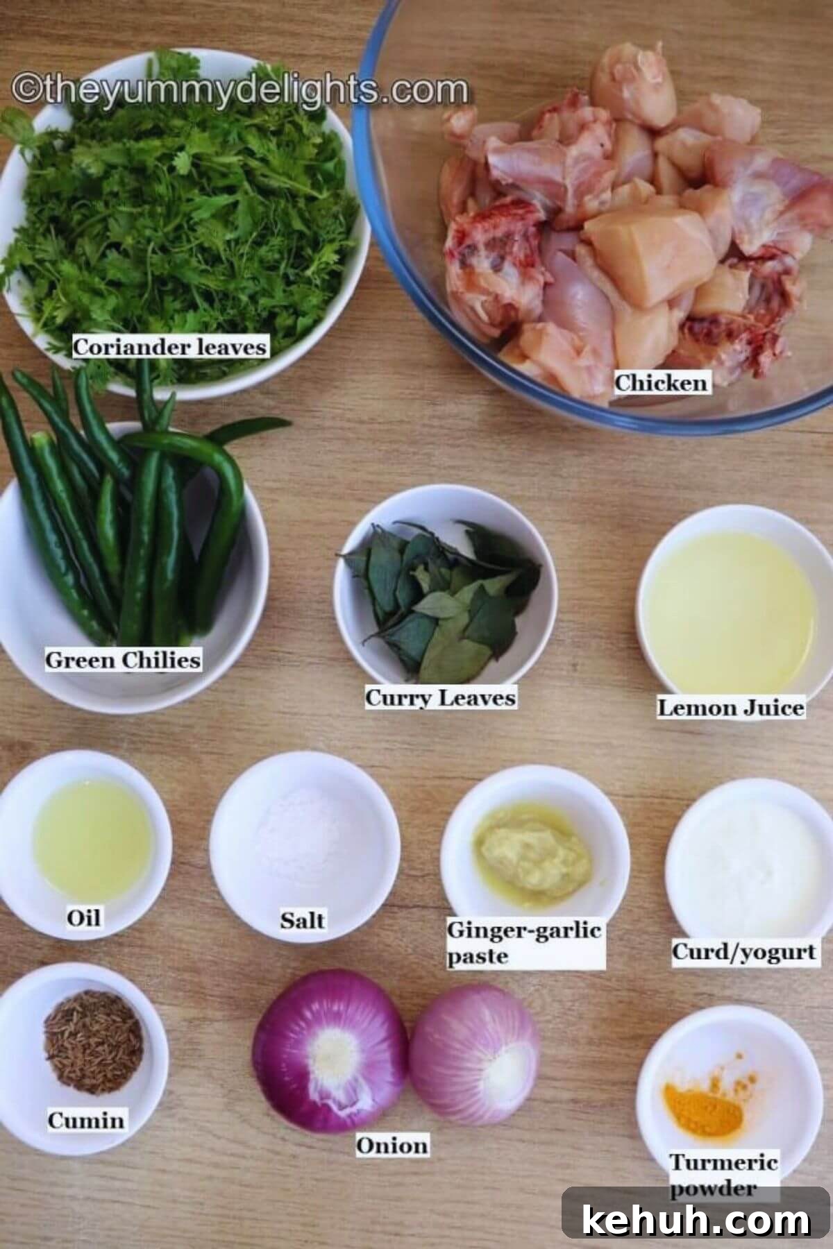 individually labelled ingredients to make green chilli chicken are laid out on a table.