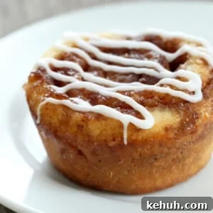 Cinnamon Rolls Without Gluten or Yeast: Soft, Fluffy Recipe 6 gluten free yeast free cinnamon rolls on small white plate with white glaze