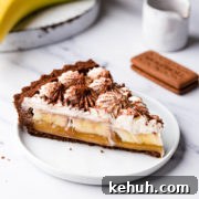Decadent Vegan Banoffee Pie Recipe for Creamy Caramel Banana Dessert 12 side close up at a slice of vegan banoffee pie on a dessert plate