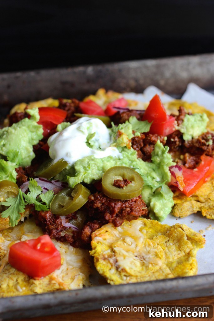 Patacón Nachos: Loaded Plantain Chips with Beef & Cheese 9 Patacón Loaded Nachos