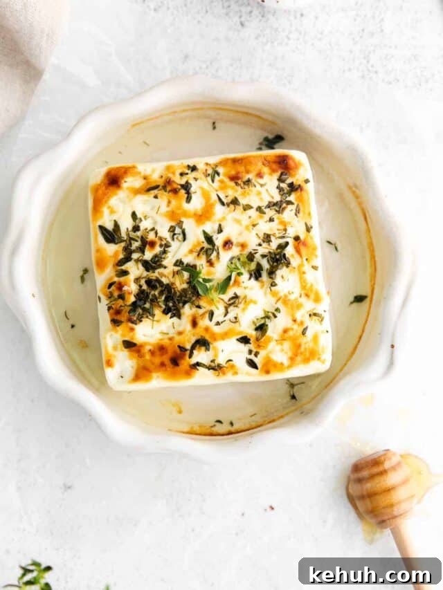 grilled feta cheese in a ramekin.