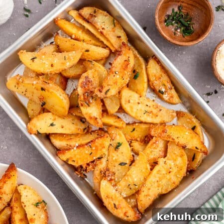Crispy Parmesan and Thyme Roasted Potatoes Recipe 9 A pan of Parmesan thyme roasted potatoes.