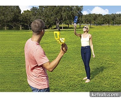 Family playing backyard games