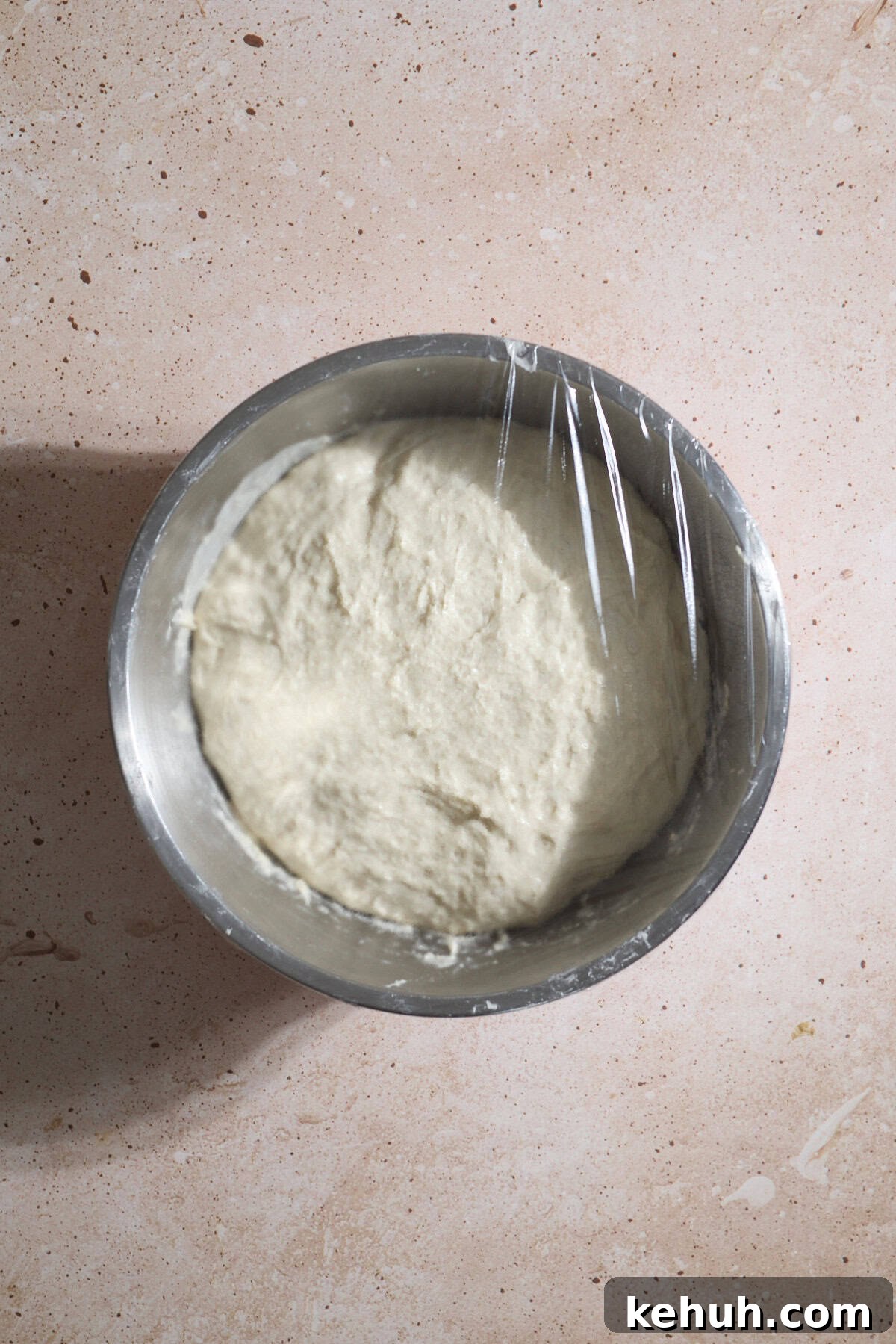 Sourdough Discard Bread Recipe: Crispy Crust, Soft Crumb 7 Dough in the bowl after rising.