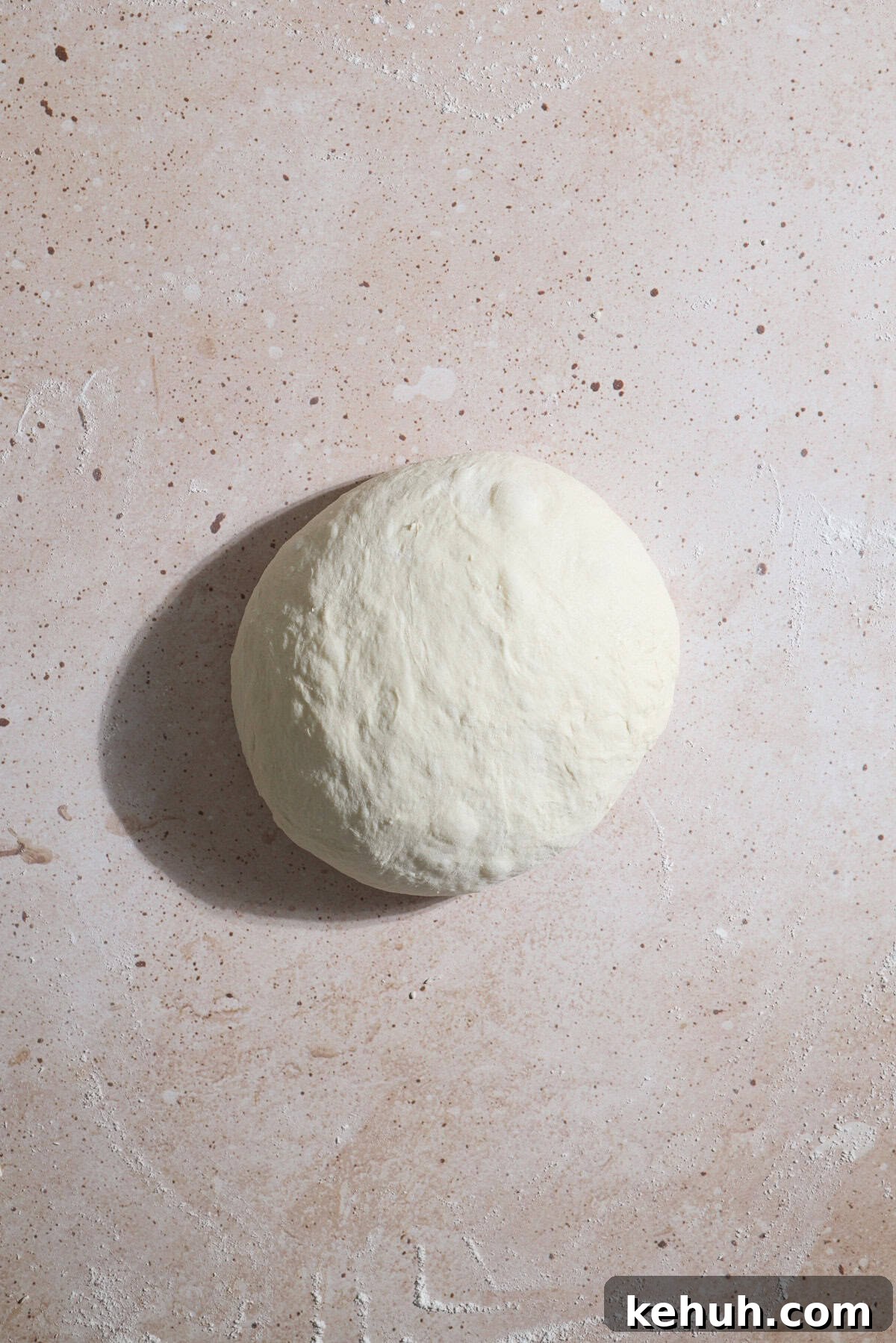 Sourdough Discard Bread Recipe: Crispy Crust, Soft Crumb 9 Dough formed into a taut ball.