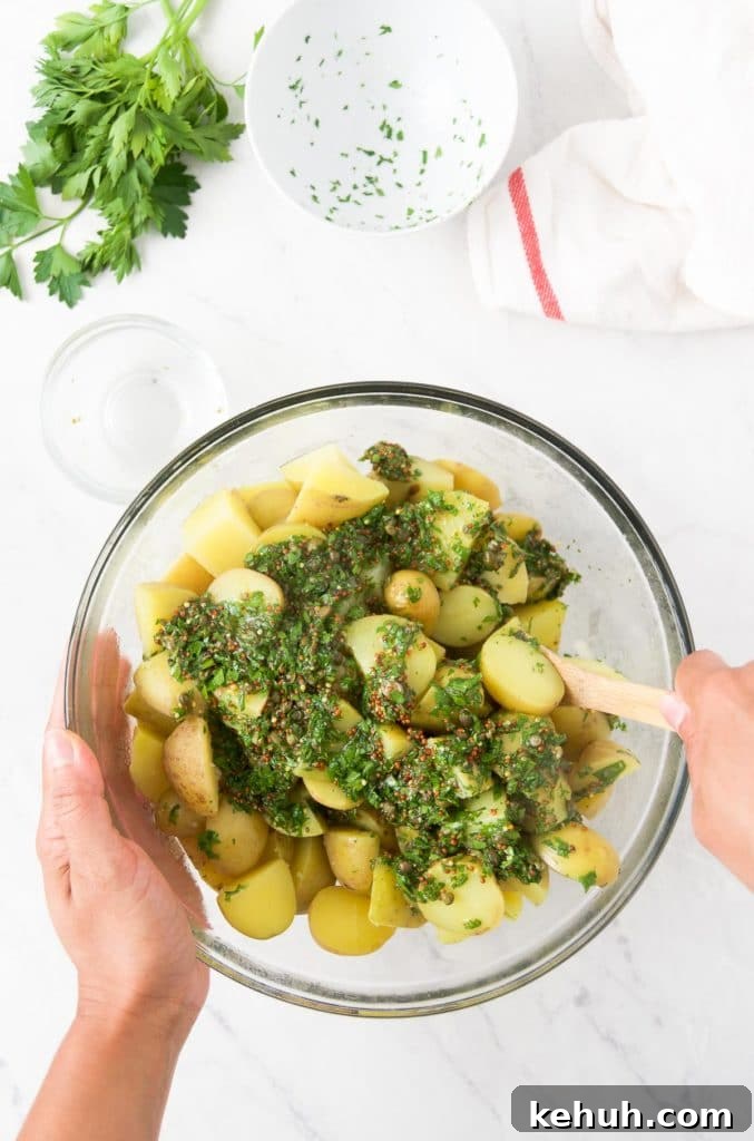 A woman stirs the ingredients together in a bowl
