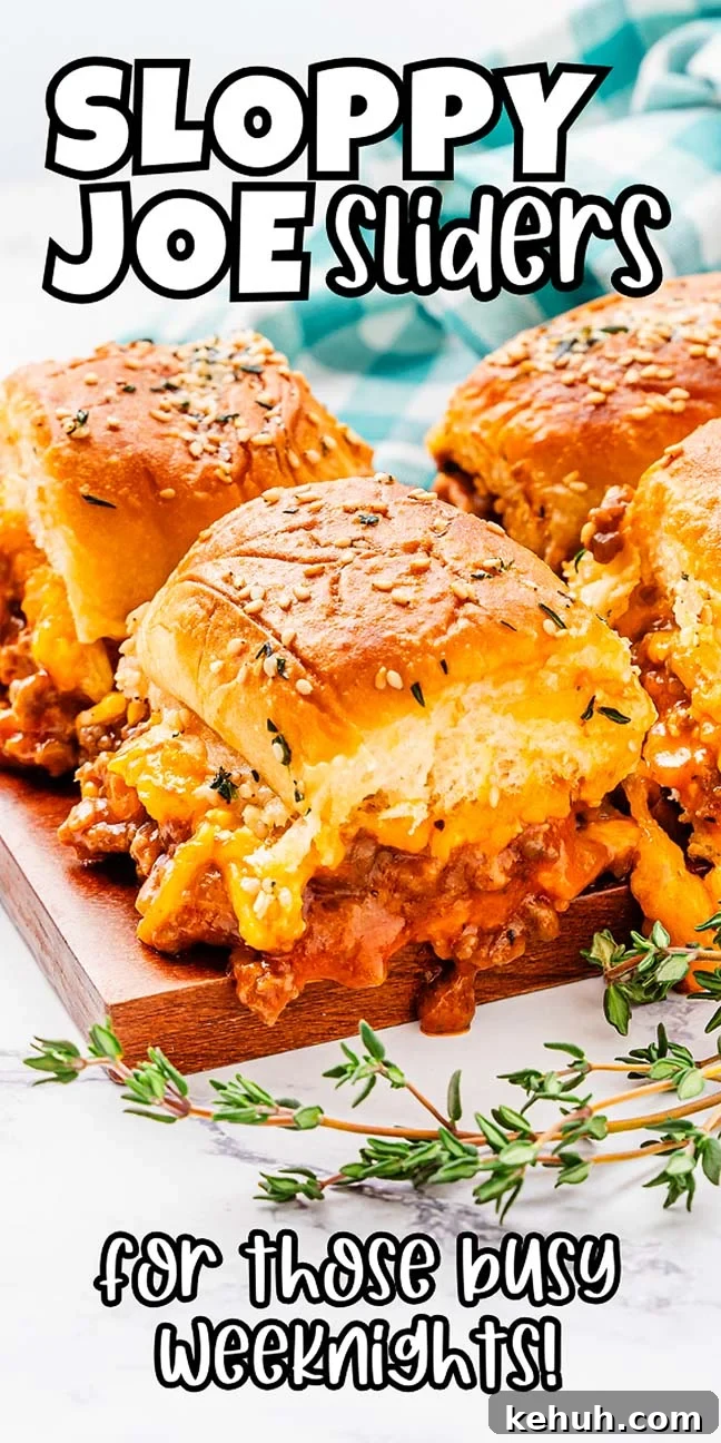 Savory Sloppy Joe Sliders Recipe for Game Day and Parties 22 Close-up of sloppy joes sliders on a wooden board. The sliders are filled with ground beef in a rich tomato sauce and topped with sesame seed buns. Green herbs are sprinkled around. Text reads, 'Sloppy Joe Sliders' and 'Perfect for those busy weeknights!'