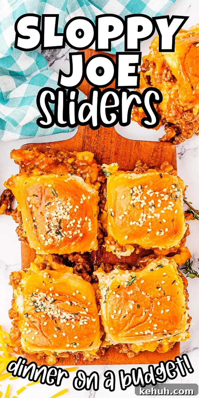 Savory Sloppy Joe Sliders Recipe for Game Day and Parties 23 A wooden board with four sloppy joes sliders topped with sesame seeds and garnished with herbs. Text reads 'sloppy joe sliders' and 'dinner on a budget.'