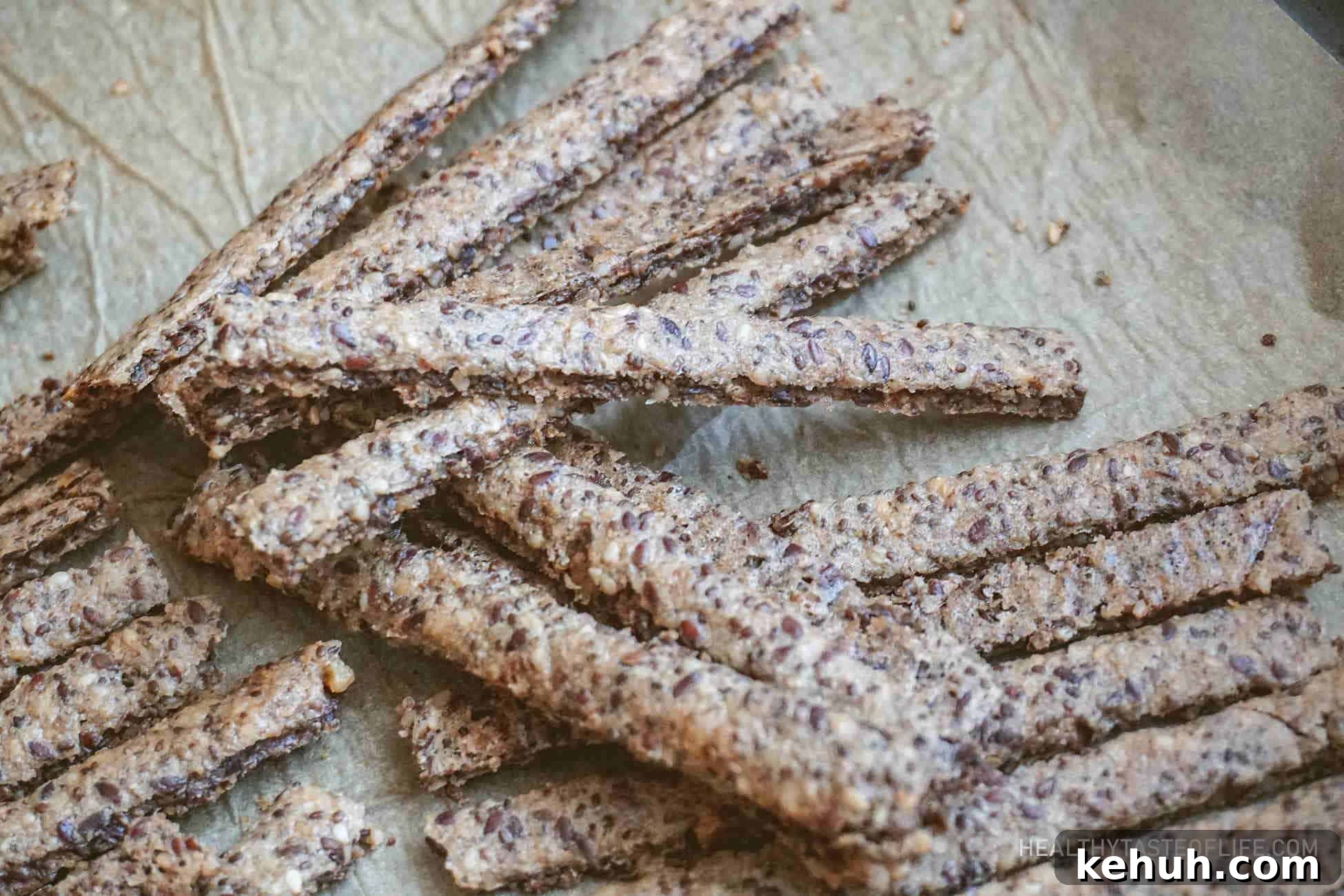 Crispy Quinoa Cracker Sticks — Gluten-Free Vegan Snack 2 crunchy gluten-free quinoa cracker sticks made with seeds and walnuts