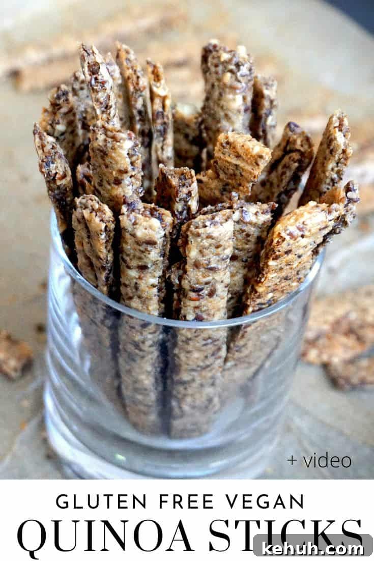 Crispy Quinoa Cracker Sticks — Gluten-Free Vegan Snack 7 quinoa cracker sticks standing in a glass pin