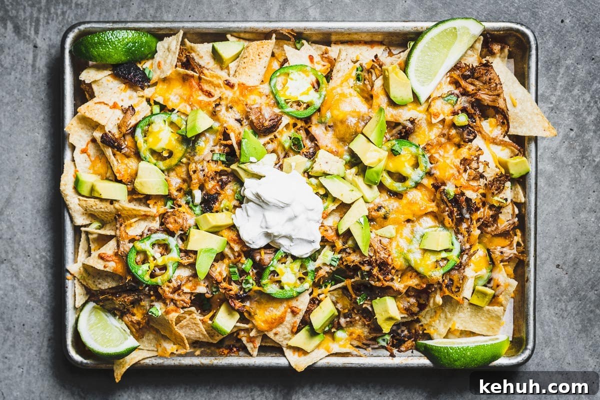 pulled pork nachos on a sheet pan overhead