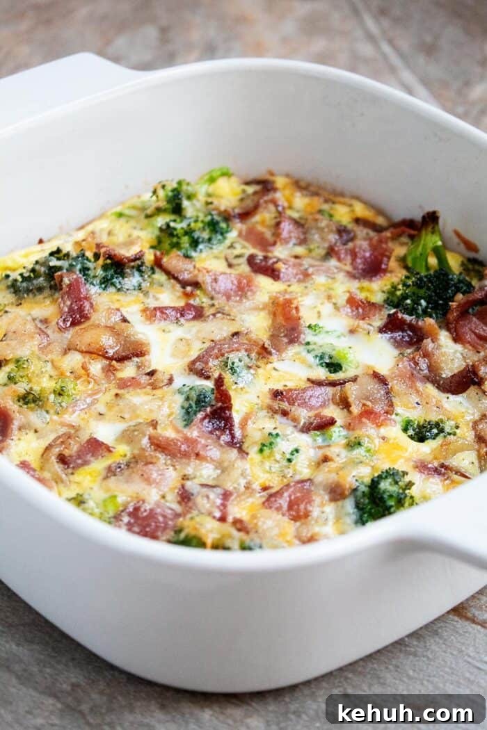 Keto 4th of July Recipes for Your Patriotic Cookout 91 closeup of white casserole dish containing keto breakfast casserole fully baked
