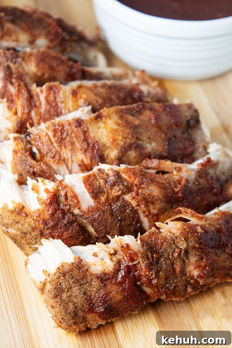 Keto 4th of July Recipes for Your Patriotic Cookout 3 keto ribs on a wooden cutting board