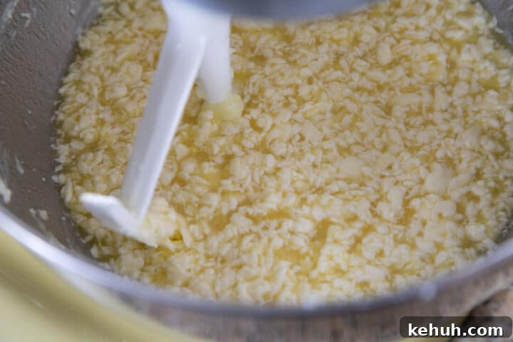 Fluffy Mashed Potato Dinner Rolls: Soft, Buttery Recipe 6 butter, sugar, eggs, and water in a stand mixer bowl.
