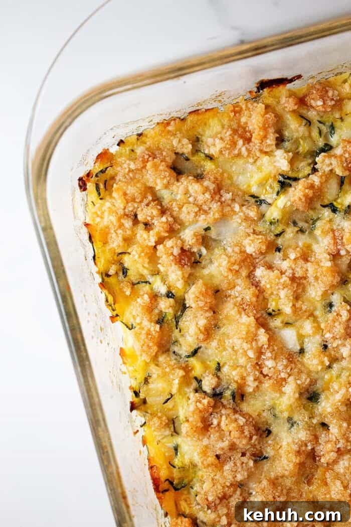 Keto 4th of July Recipes for Your Patriotic Cookout 59 overhead view of keto zucchini casserole in glass casserole dish ready to be served