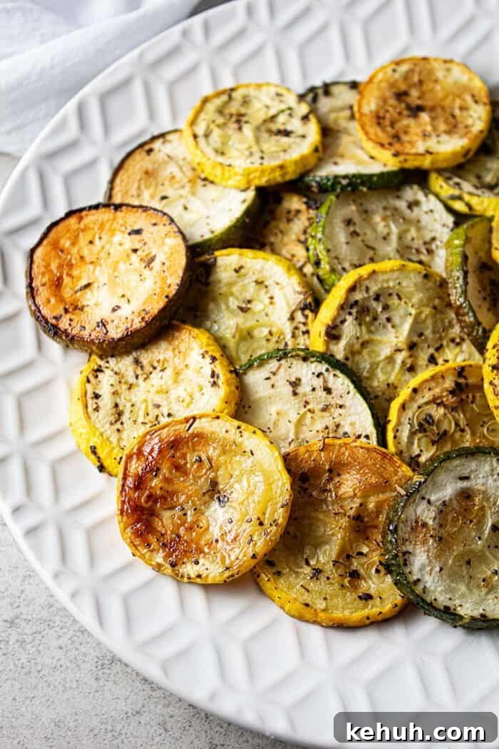 Keto 4th of July Recipes for Your Patriotic Cookout 70 overhead view of oven baked roasted zucchini and squash on a white serving dish
