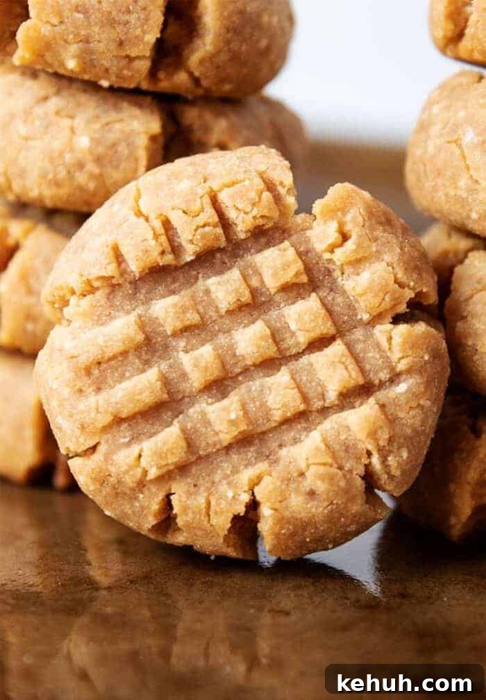 Keto 4th of July Recipes for Your Patriotic Cookout 87 stack of keto peanut butter cookies on cookie sheet