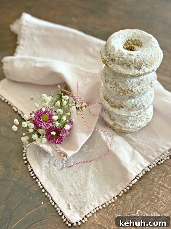 How to Make Classic Powdered Sugar Donuts at Home 10 Baked Powdered Sugar Donuts stack