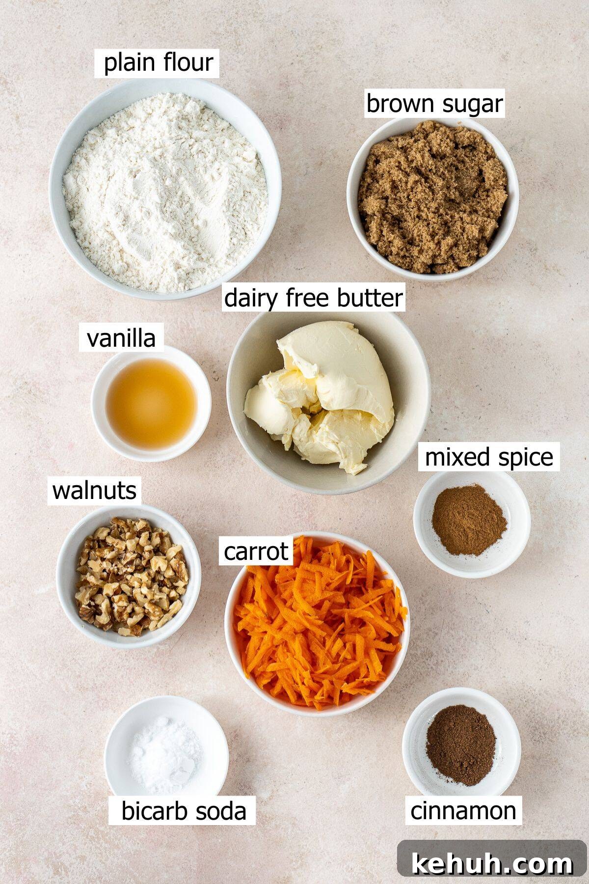 All ingredients needed to make vegan carrot cake cookies laid out in bowls.