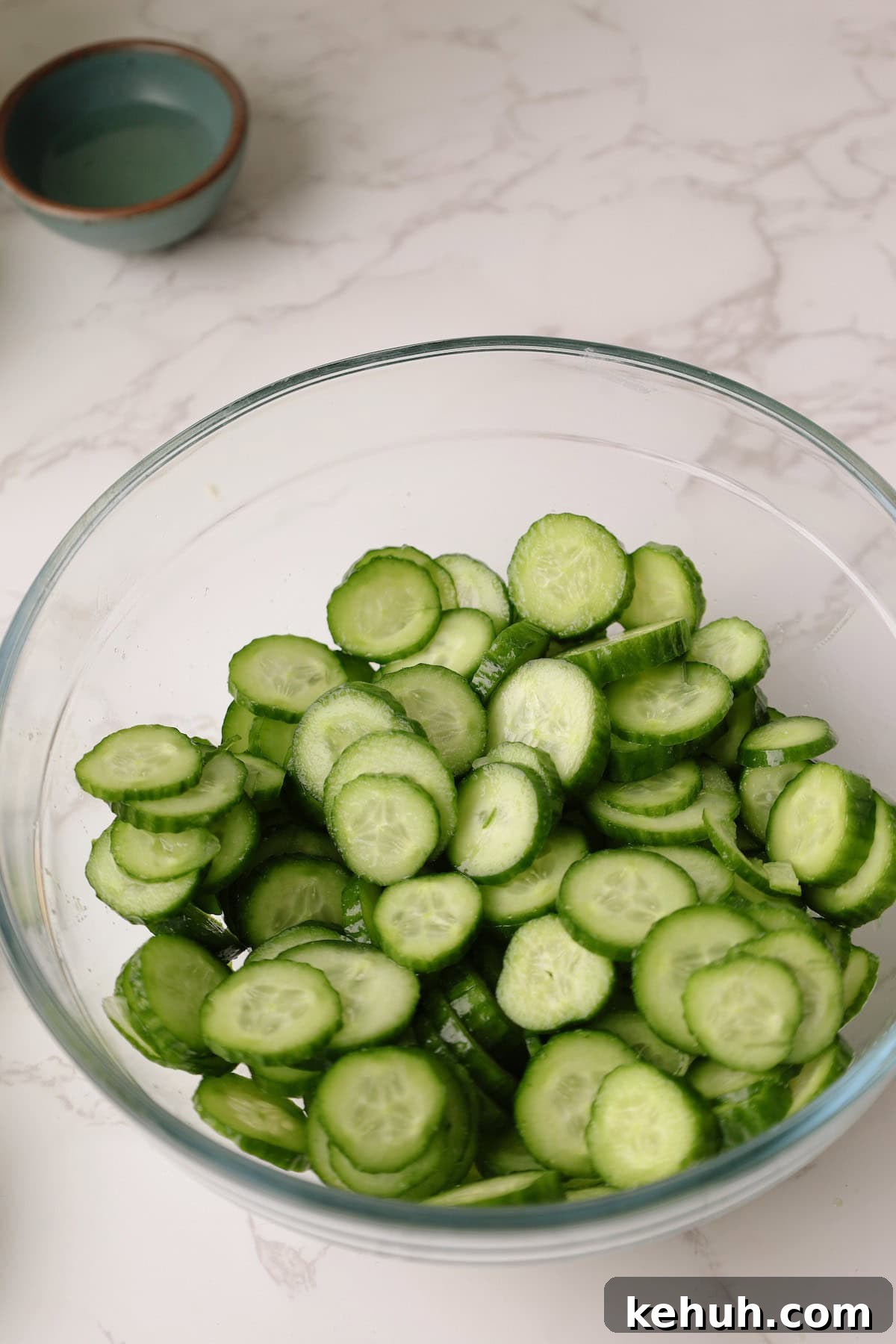Step one: cucumbers in a bowl with salt.
