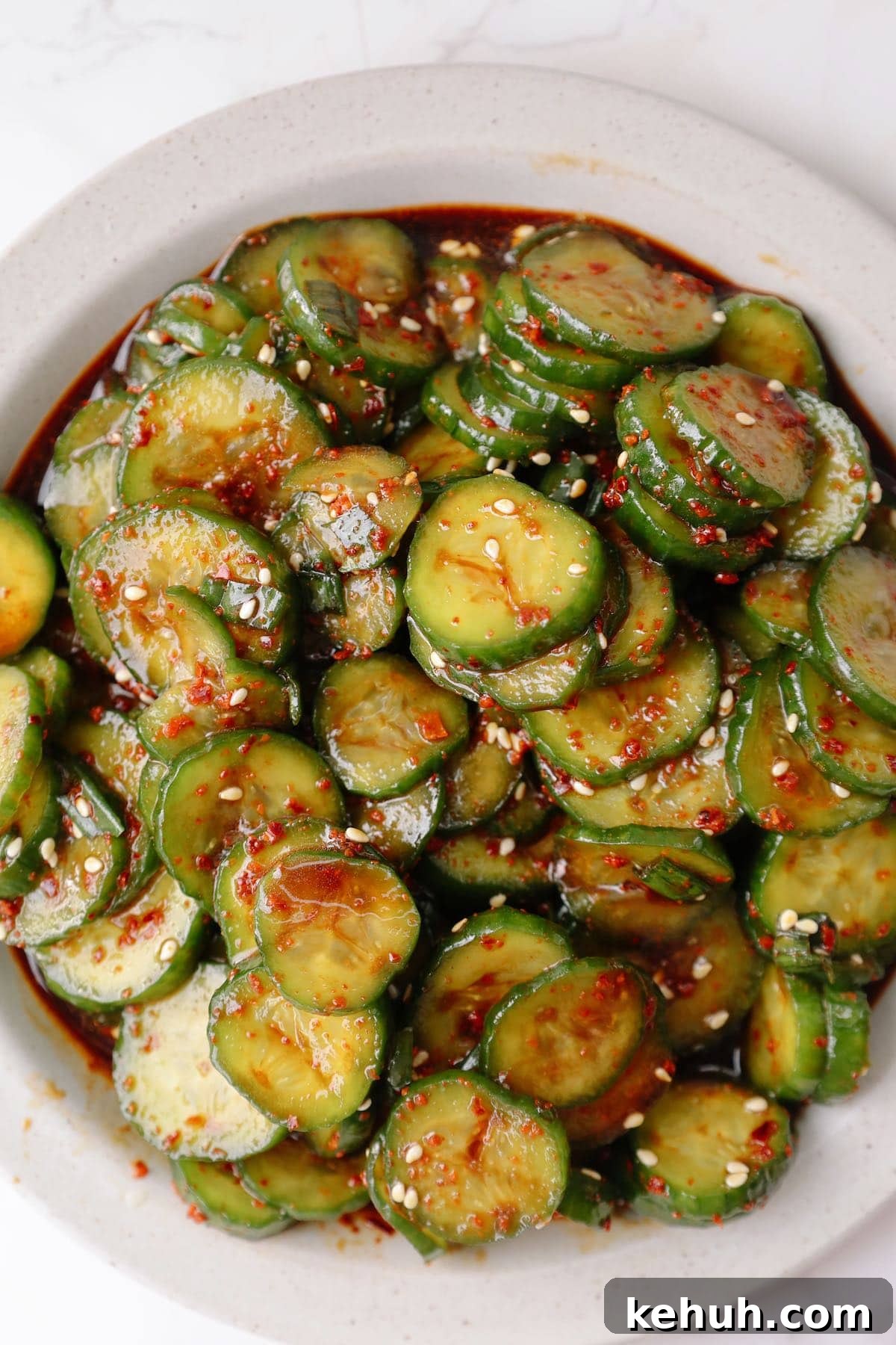 Step four: garnish and serve the Korean cucumber salad.