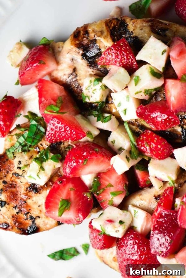 Gluten-Free Strawberry Cupcakes with Cream Cheese Frosting 9 Strawberry basil chicken on a white plate topped with extra chopped basil