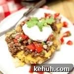 Loaded smashed potatoes with fresh salsa and sour cream.