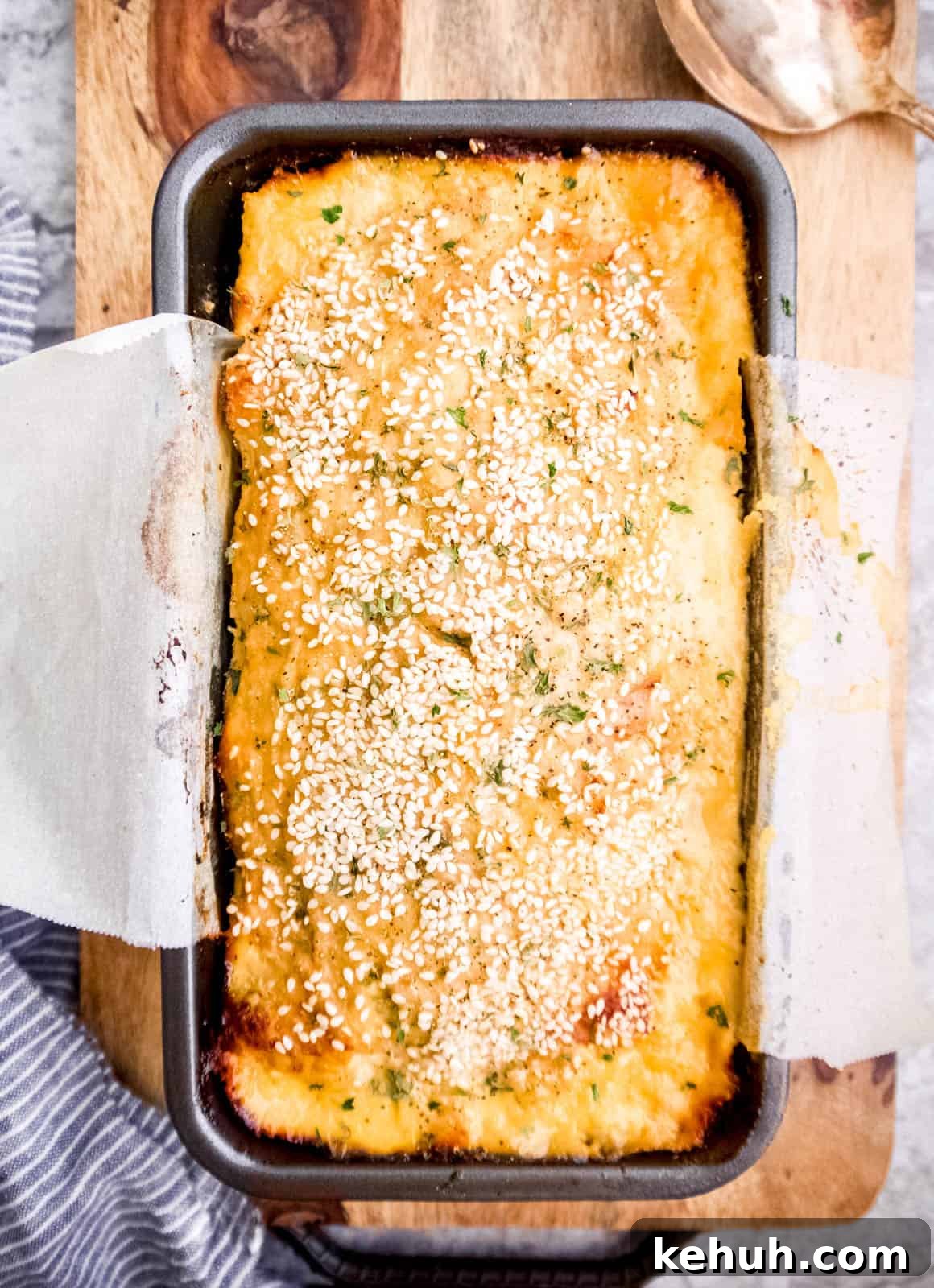 Honey Sesame Paleo Turkey Meatloaf Recipe for Low-Carb Dinners 3 Paleo turkey meatloaf with honey sesame seasoning in a pan.