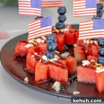 Watermelon stars appetizer with blueberries and feta cheese.
