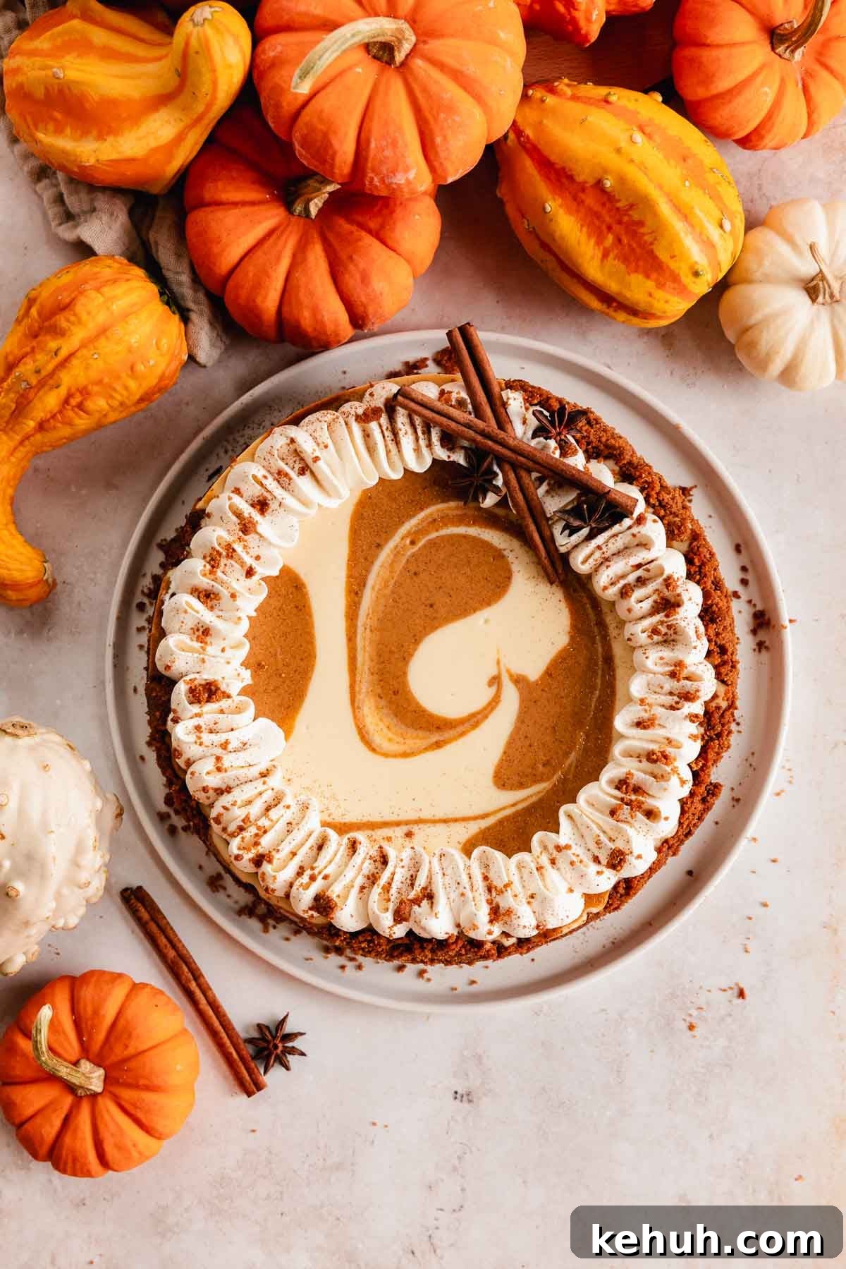 Pumpkin Swirl Cheesecake Recipe: Creamy Autumn Dessert 5 pumpkin pie cheesecake with whipped cream
