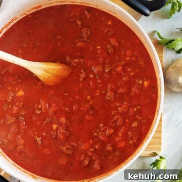 Top down view of a pan of beef bolognese.
