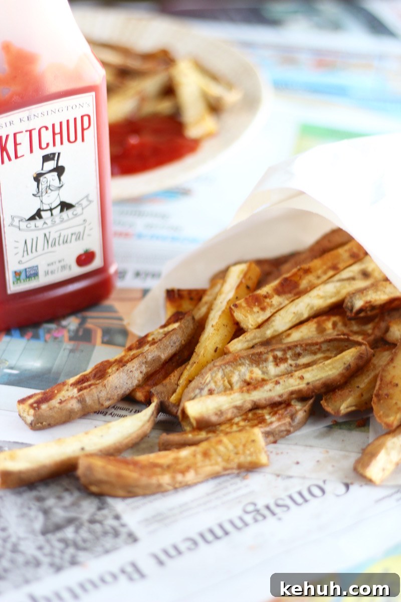 White Sweet Potato Oven Fries - healthy white sweet potato wedges are slathered in coconut oil, your favorite spices, and baked to golden-brown perfection! YUM! | fedandfulfilled.com
