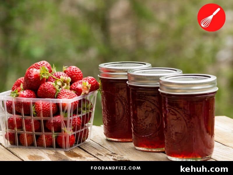 The spores of the bacteria that causes botulism are neutralized in high temperatures and acidic environments, such as the environment in a jar of fruits like strawberries.