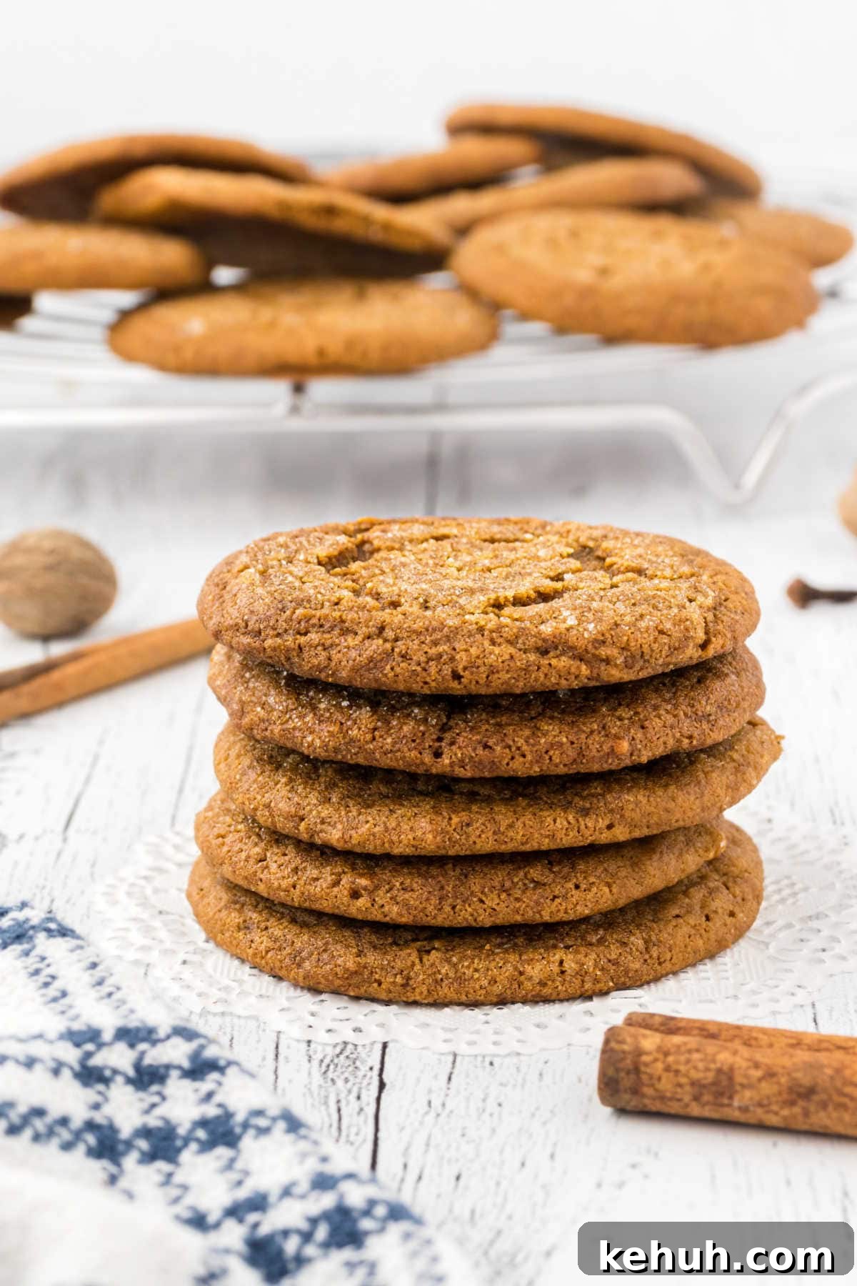 Chewy Molasses Crinkle Cookies Recipe 5 A stack of cookies on a table.