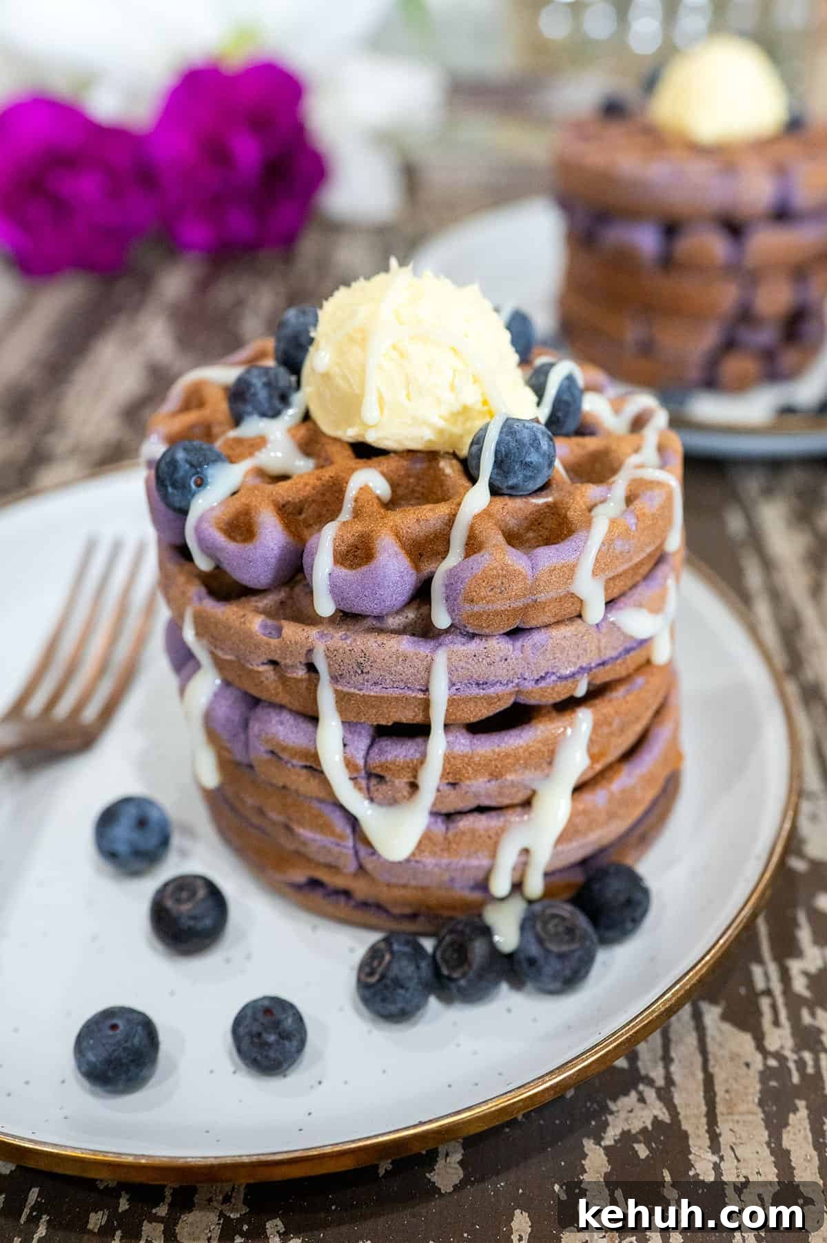 Ube Waffles Recipe: Crispy Purple Filipino Waffles 10 Stack of purple ube waffles.