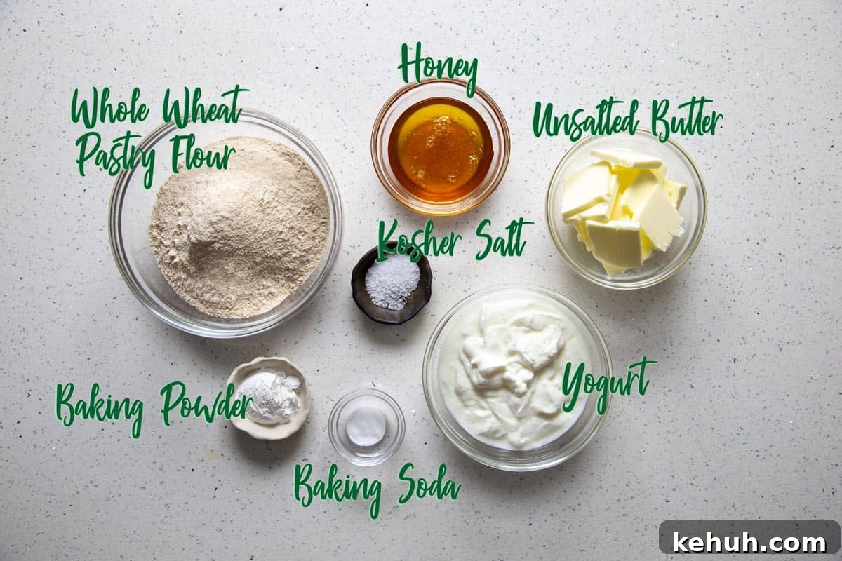 Honey Whole Wheat Biscuits Biscuit ingredients on a marble surface.
