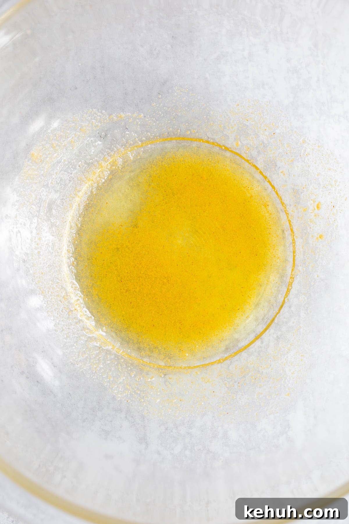 Oil and seasonings in a bowl.