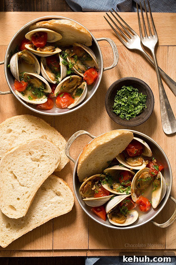 Learn how to make Steamed Clams with Pan Roasted Tomatoes as an easy date night appetizer to make at home! This recipe makes enough to serve two people, ideal for Valentine’s Day, anniversaries, birthdays, and days off together.