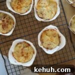 Bacon muffins in tulip liners on baking rack.