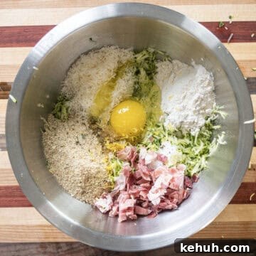 Crispy Air Fryer Zucchini Fritters Recipe 6 All ingredients in a bowl.