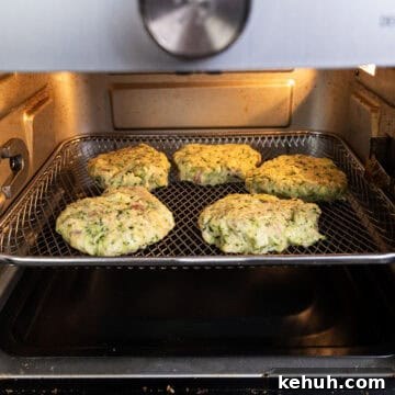 Crispy Air Fryer Zucchini Fritters Recipe 9 Air frying zucchini fritters.