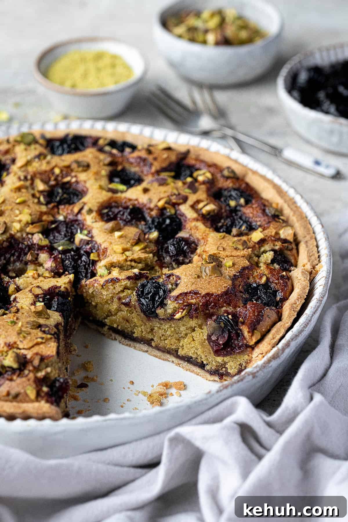 Vegan Pistachio and Cherry Frangipane Tart Recipe 3 Close up of the sliced tart.