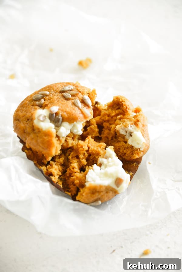 Pumpkin Cream Cheese Muffins cut in half. 