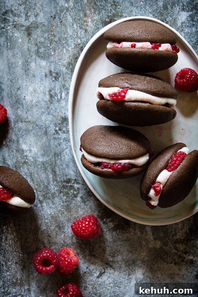 Chocolate Raspberry Ripple Whoopie Pies: Soft Chocolate Cakes with Raspberry Swirl 3 Chocolate Raspberry Whoopie Pies via Bakers Royale